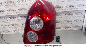 O95009 Gebruikte achterlicht rechts Mazda 323F