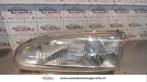 O72854 Gebruikte linker koplamp Mitsubishi Colt