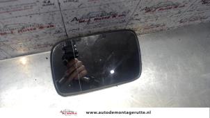 O85986 Gebruikte spiegelglas links Volkswagen Polo