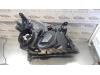 Gebruikte Koplamp links Opel Vectra O71999
