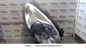 O74091 Gebruikte koplamp rechts Citroen Picasso