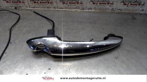 O79845 Gebruikte portiergreep 2deurs links Mini ONE