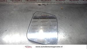 O86024 Gebruikte spiegelglas links Volkswagen Transporter