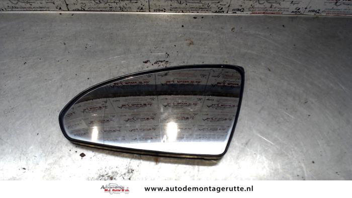 Gebruikte Spiegelglas links Nissan Primera O86081