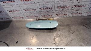 O89524 Gebruikte portiergreep 4deurs links-achter Toyota Yaris