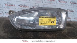 O72855 Gebruikte linker koplamp Mitsubishi Colt