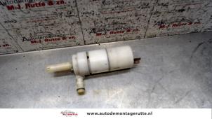 O71671 Gebruikte koplamp sproeier Lancia Thesis