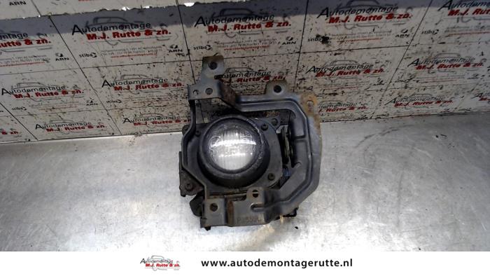 Gebruikte Mistlamp links-voor Mitsubishi Lancer O74952