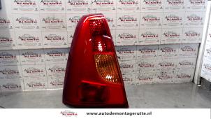O93267 Gebruikte achterlicht links Dacia Logan