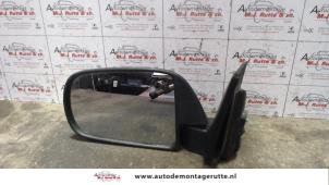 O85569 Gebruikte spiegel buiten links Daihatsu Cuore