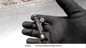 O121437 Gebruikte injector (benzine injectie) Dacia Logan