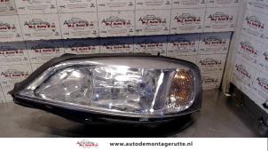 O71937 Gebruikte linker koplamp Opel Astra