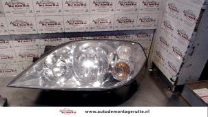 O72410 Gebruikte linker koplamp Nissan Primera