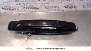 O80296 Gebruikte portiergreep 4deurs links-voor Ssang Yong Rexton