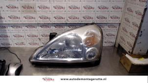 O73116 Gebruikte linker koplamp Suzuki Liana