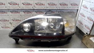 O73025 Gebruikte koplamp links Daihatsu Young RV
