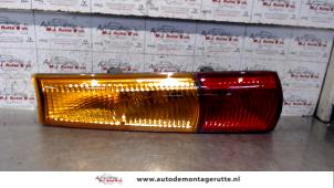 O95259 Gebruikte achterlicht rechts Subaru Justy