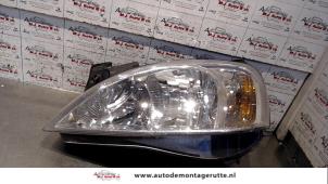 O71983 Gebruikte linker koplamp Opel Corsa