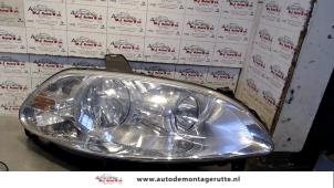 O73671 Gebruikte rechter koplamp Fiat Croma
