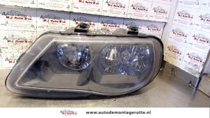 O72842 Gebruikte koplamp links Rover 25