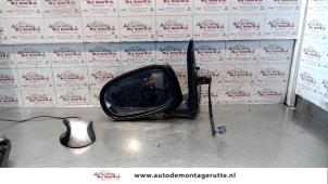 O84922 Gebruikte spiegel buiten links Nissan Almera Tino