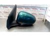 Gebruikte Spiegel Buiten links Nissan Almera Tino O84922