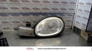 O72337 Gebruikte koplamp links Chrysler Neon