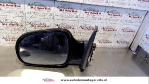 O85602 Gebruikte buitenspiegel links Daihatsu Sirion