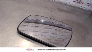 Gebruikte Spiegelglas links Ford Focus 2 Wagon 1.6 TDCi 16V 90 Prijs op aanvraag aangeboden door Autodemontage M.J. Rutte B.V.
