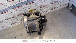 O124329 Gebruikte alternator Kia Carnival