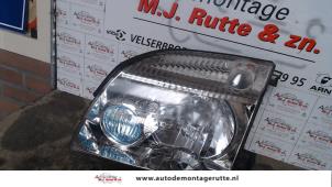O72441 Gebruikte koplamp links Nissan X-Trail