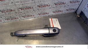 O80183 Gebruikte deurgreep 4deurs links-voor Mazda 3.