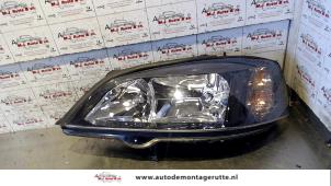 O71948 Gebruikte linker koplamp Opel Astra