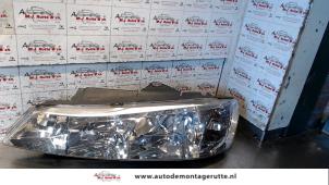 O72700 Gebruikte koplamp links Peugeot 406