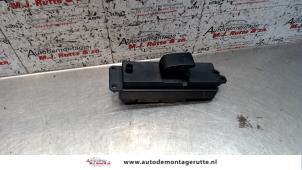 O107466 Gebruikte schakelaar elektrisch raam Mazda 3.
