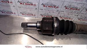 O111201 Gebruikte steekas links-voor Citroen Berlingo