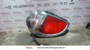 O94076 Gebruikte achterlicht links Daihatsu Sirion
