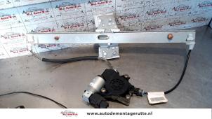 O79197 Gebruikte ruitmechaniek 4deurs rechts-voor Mazda 2.