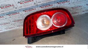 O93350 Gebruikte achterlicht links Nissan Micra