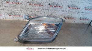 O75779 Gebruikte pinker links Nissan Micra
