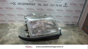 O74224 Gebruikte rechter koplamp Renault Clio