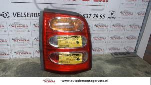 O93341 Gebruikte achterlicht links Nissan Micra
