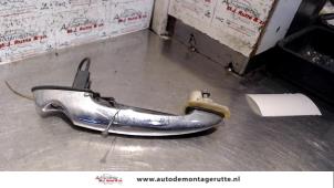 O79847 Gebruikte portiergreep 2deurs links Mini ONE