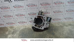 O122822 Gebruikte gasklephuis Mazda 323