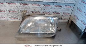O73083 Gebruikte linker koplamp Suzuki Swift