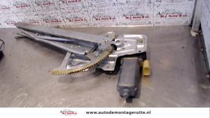 O78540 Gebruikte ruitmechaniek 4deurs links-voor Toyota Yaris