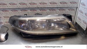 O74269 Gebruikte rechter koplamp Renault Laguna