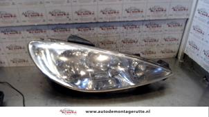 O74148 Gebruikte koplamp rechts Peugeot 206
