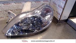 O72506 Gebruikte linker koplamp Kia Rio