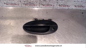 O80284 Gebruikte deurgreep 4deurs links-voor Daewoo Matiz